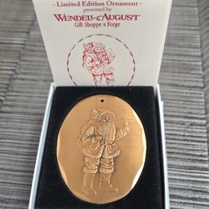 Wendell August Gold Santa Ornament